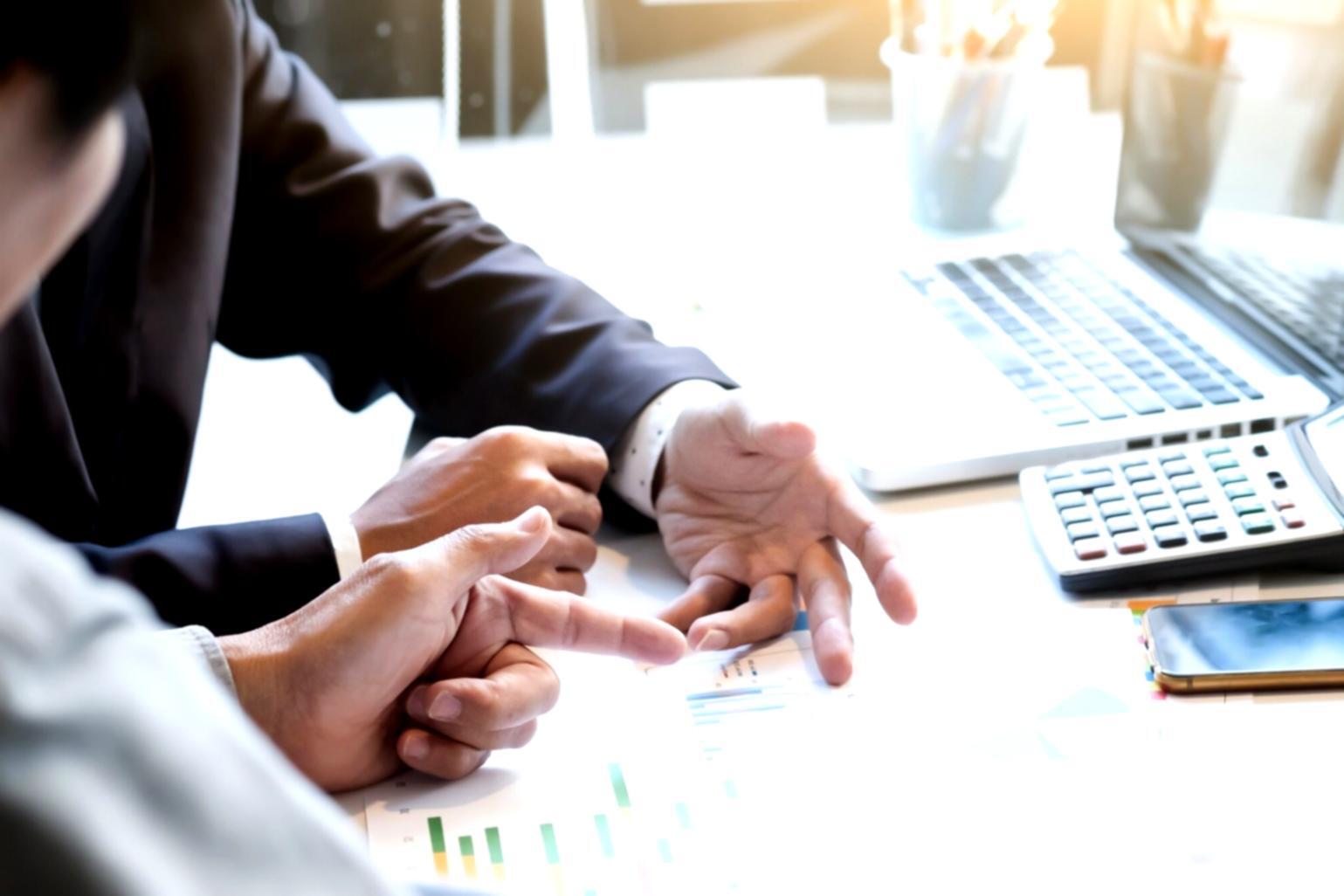 Financial planning discussion in modern office setting